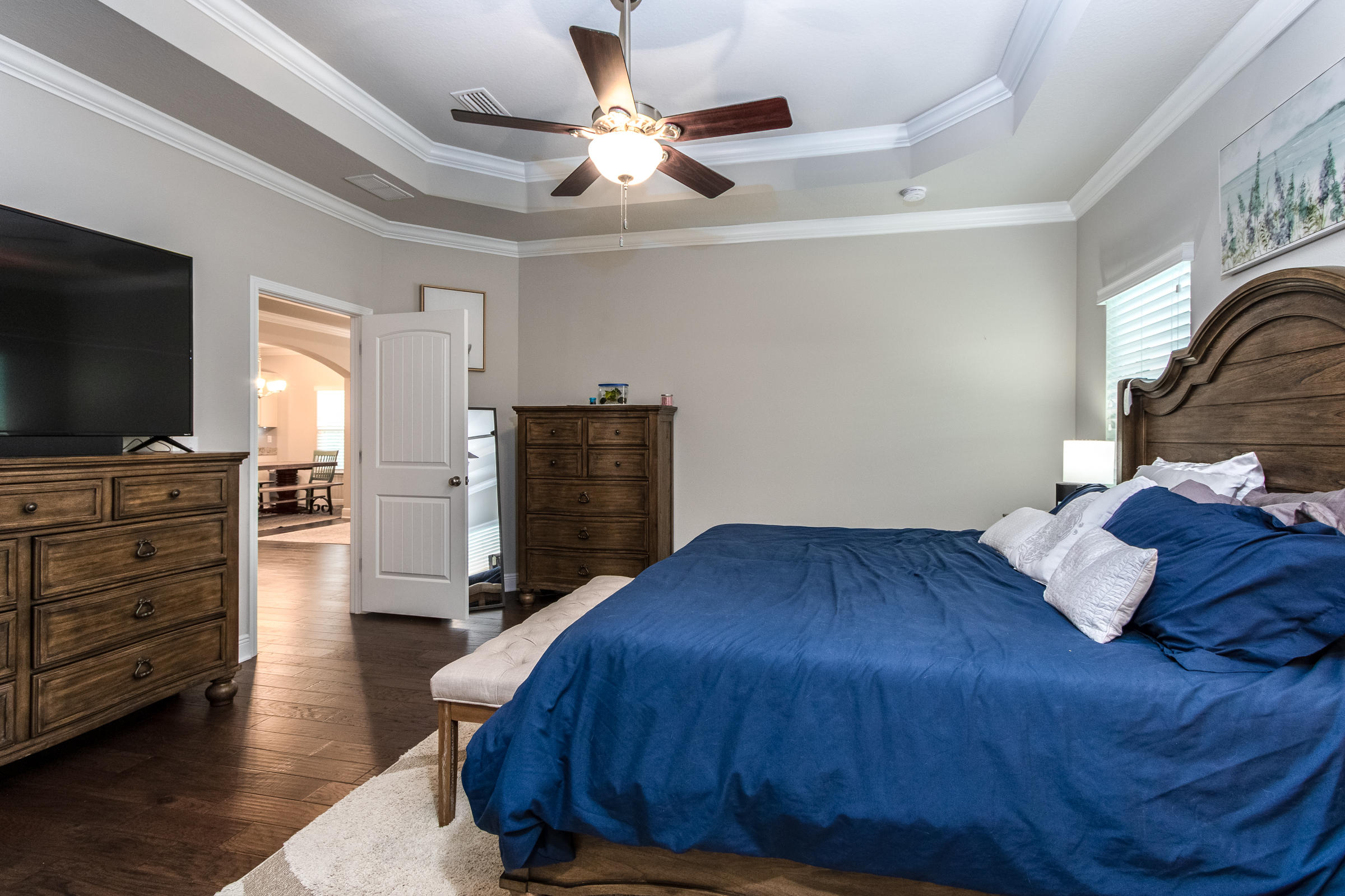 196 Pin Oak Loop Santa Rosa Beach, FL 32459 - Photo 16 of 34 a bedroom with a bed and flat screen tv