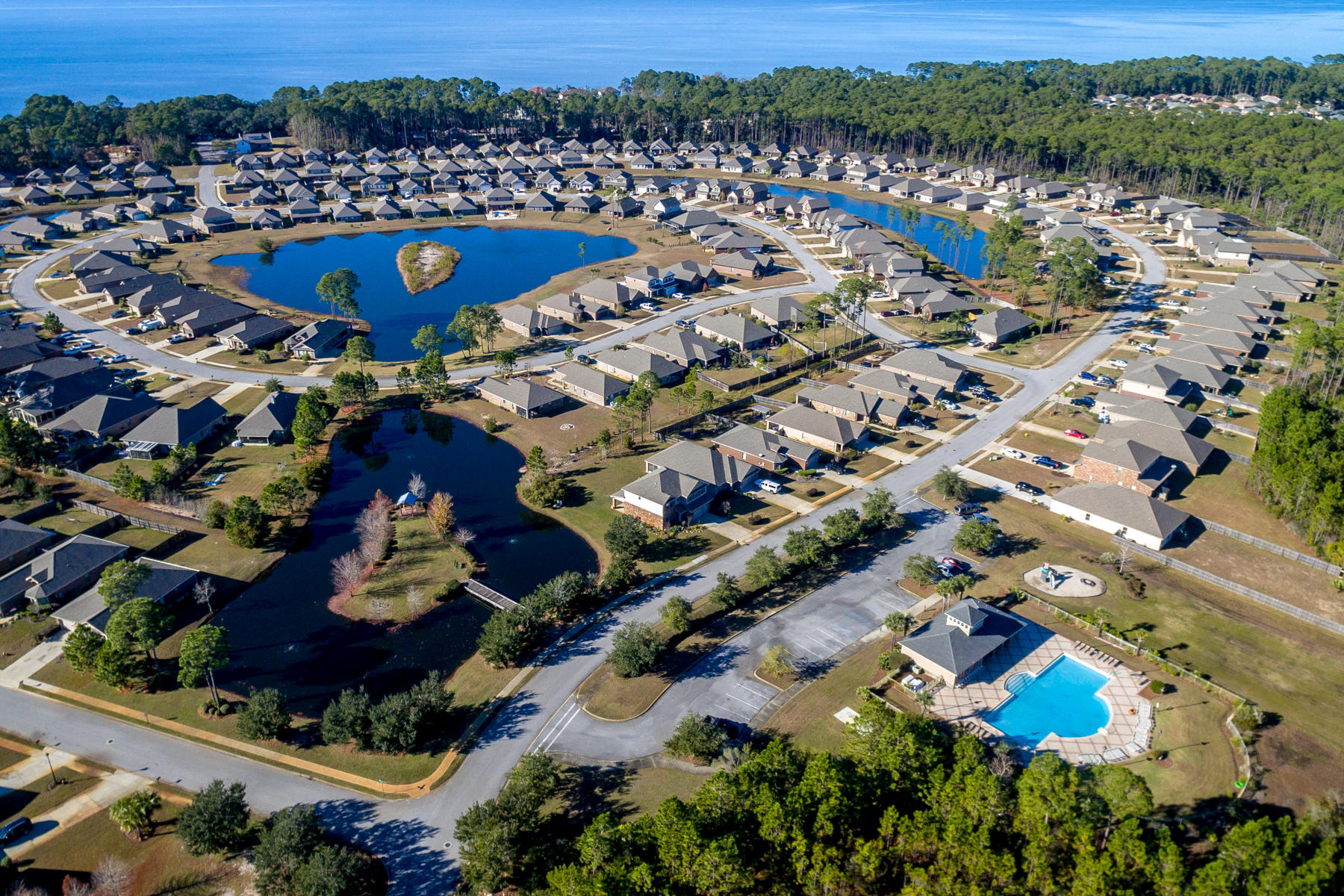 196 Pin Oak Loop Santa Rosa Beach, FL 32459 - Photo 28 of 34 an aerial view of residential houses with outdoor space