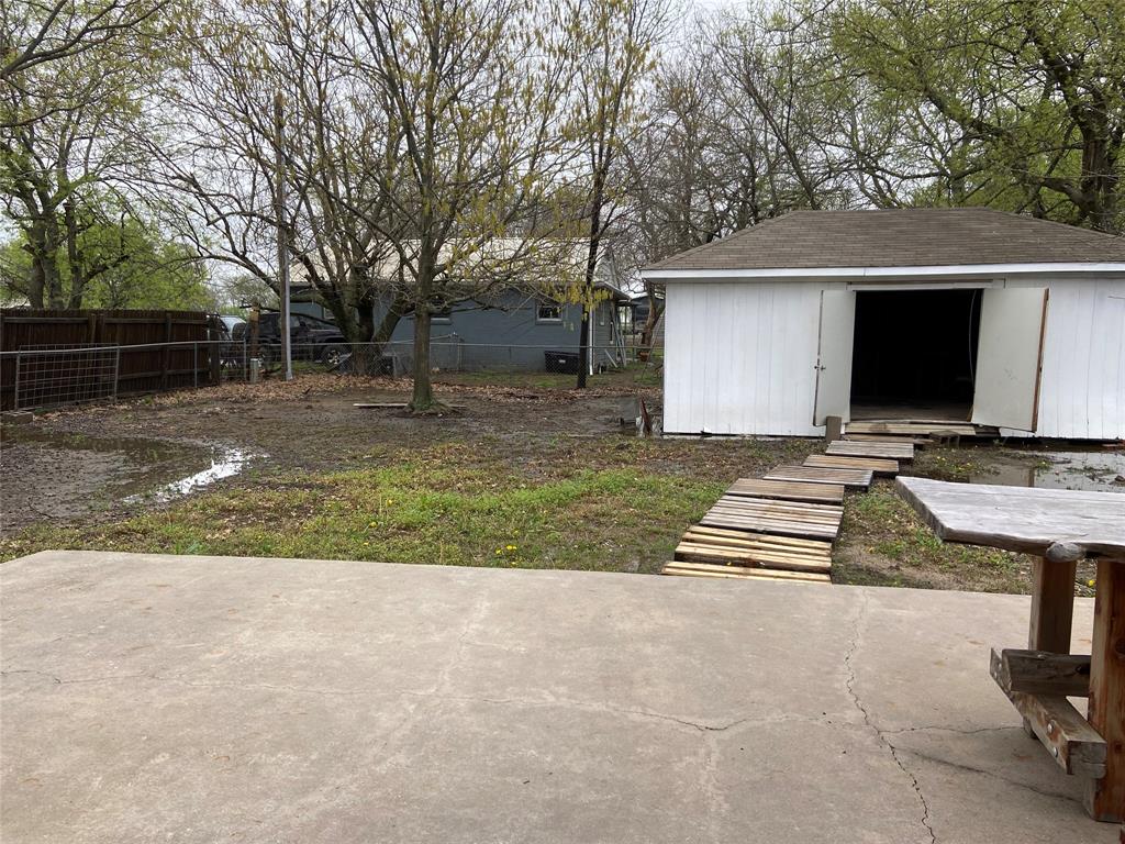 1102 North Main Street Leonard, TX 75452 - Photo 20 of 25 a view of backyard with trampoline