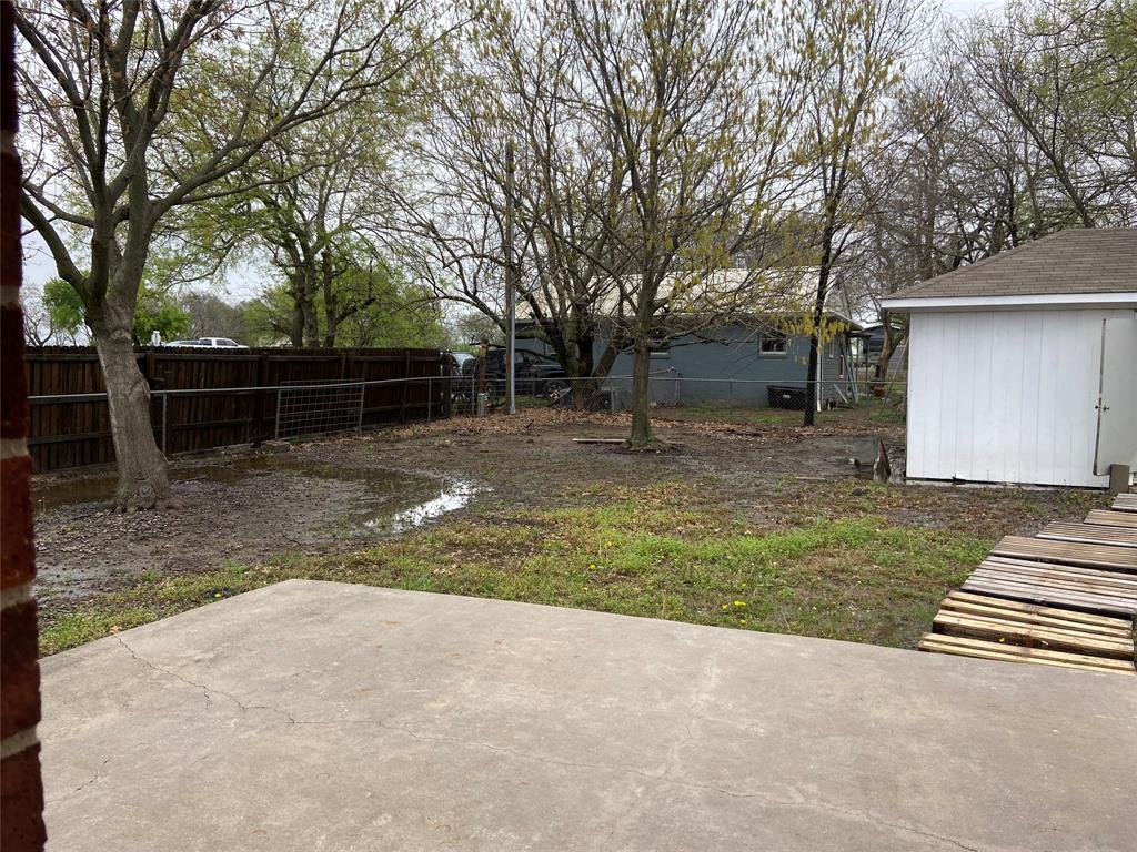 1102 North Main Street Leonard, TX 75452 - Photo 21 of 25 a backyard of a house with lots of green space