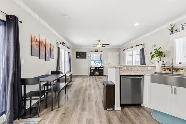 a view of a kitchen and dining room