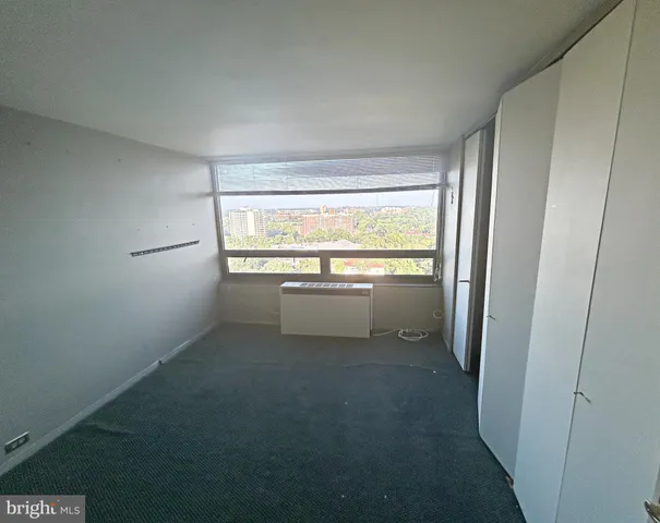 an empty room with a door