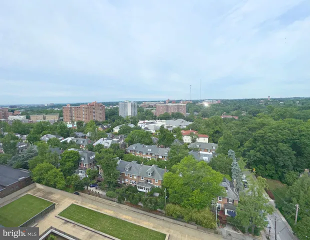 a view of a swimming pool with a lounge chairs