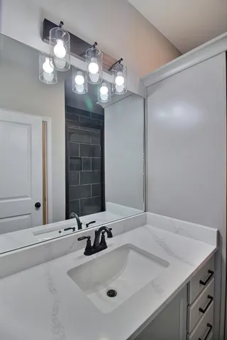 a bathroom with a shower and a toilet