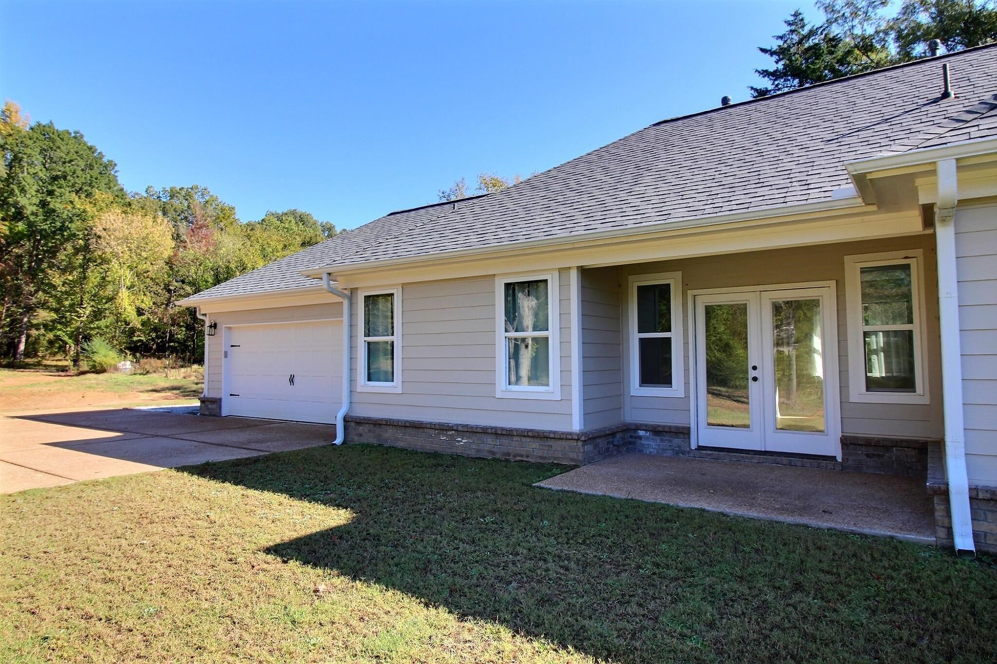 3290 Raleigh Lagrange Drive Rossville, TN 38066 - Photo 21 of 25 a view of a house with a yard