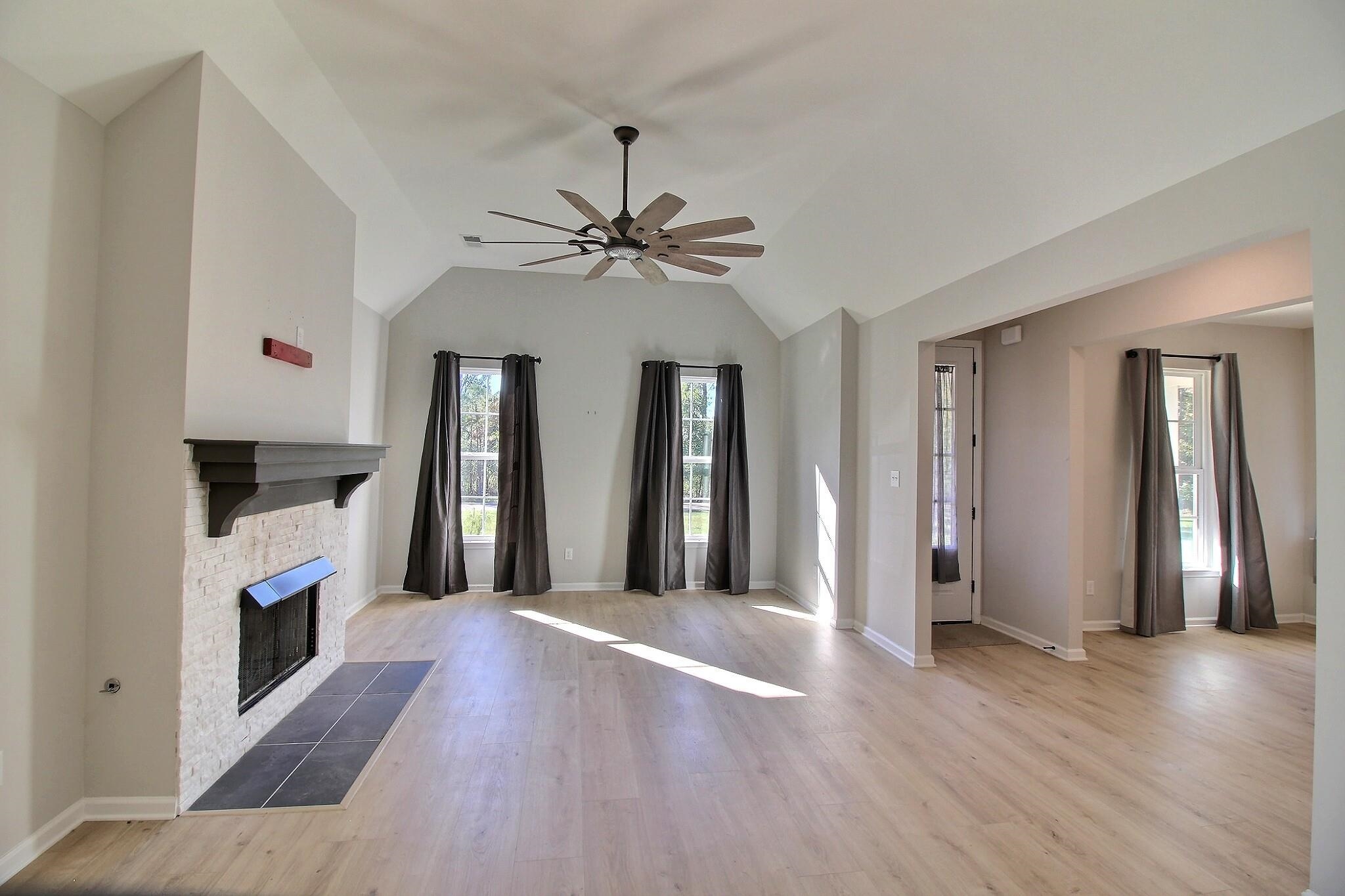 3290 Raleigh Lagrange Drive Rossville, TN 38066 - Photo 10 of 25 a view of an empty room with window and wooden floor