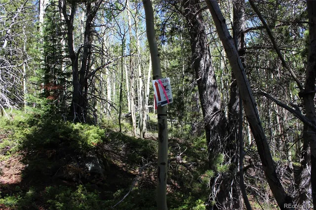 a street sign on a sidewalk