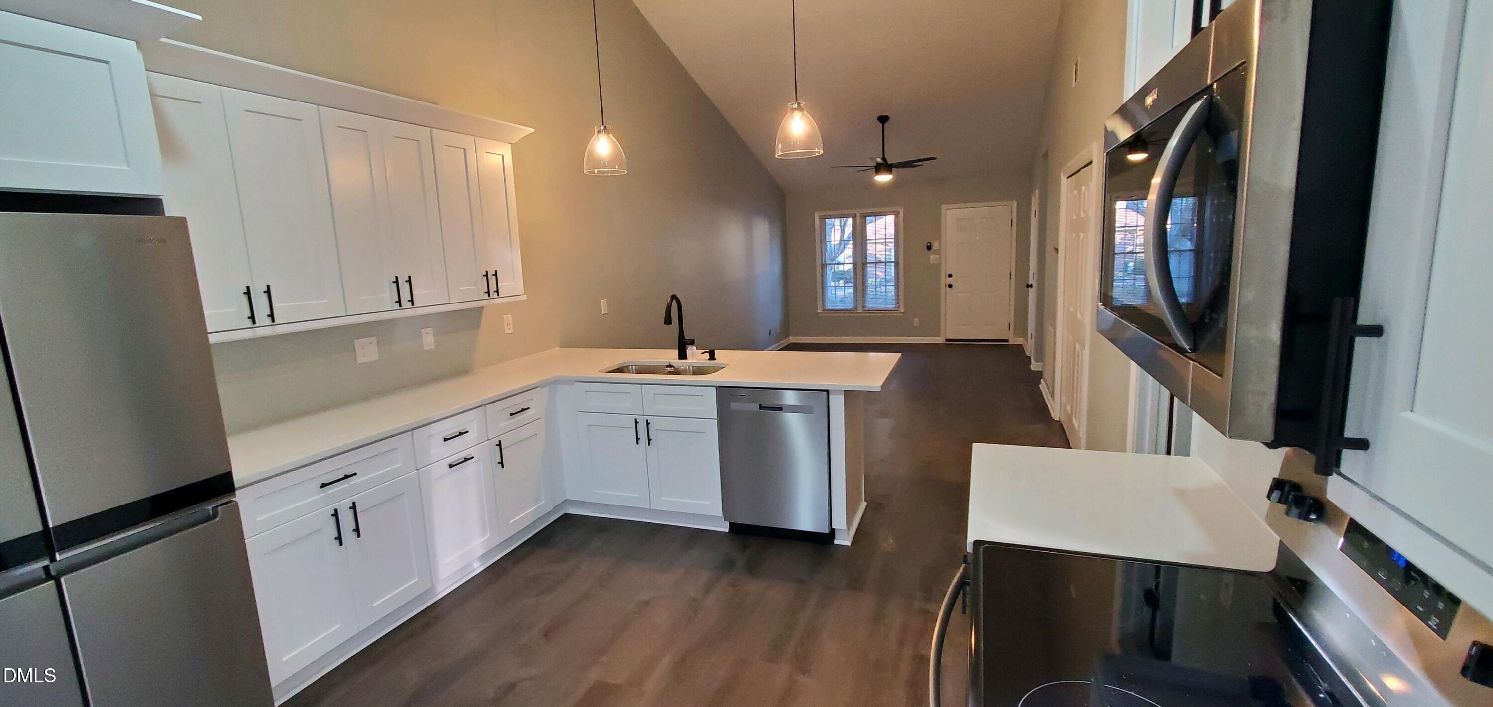 20 Sparger Springs Lane Durham, NC 27705 - Photo 8 of 11 a view of a kitchen with electric appliances