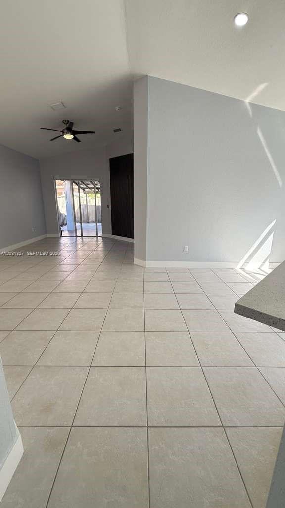 2120 Northeast 37th Road, Unit 1 Homestead, FL 33033 - Photo 16 of 30 a view of an empty room with a window