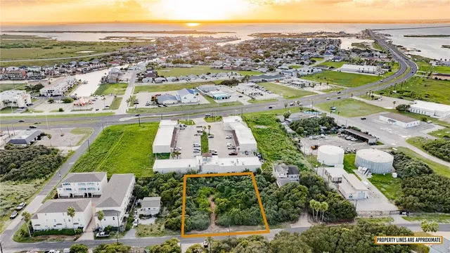 a view of a city with an ocean view