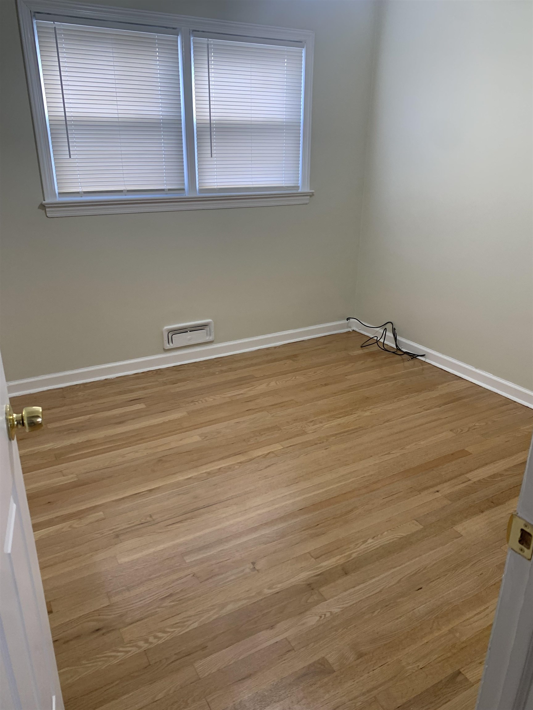 836 Eighth Street Secaucus, NJ 07094 - Photo 5 of 9 a view of a room with wooden floor and cabinets