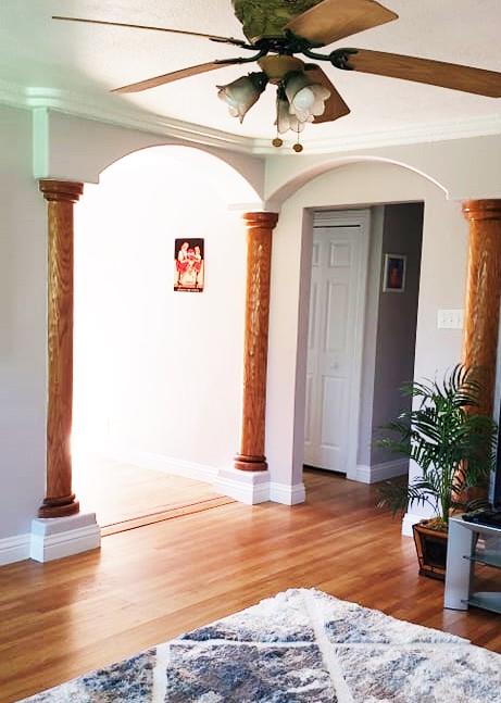 1659 Center Road Novato, CA 94947 - Photo 3 of 17 a view of a hallway with wooden floor and a potted plant