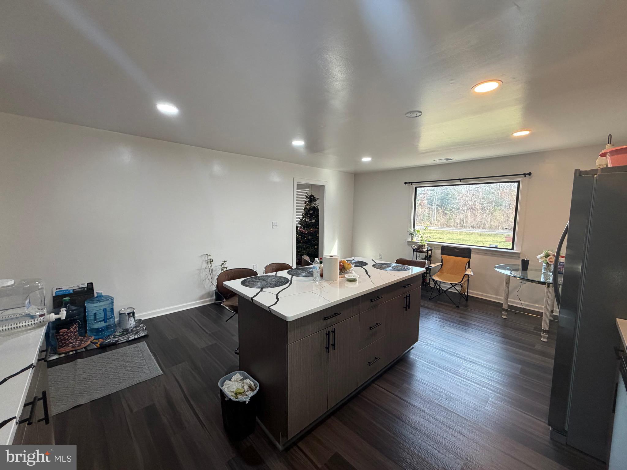 9250 Slidell La Plata, MD 20646 - Photo 16 of 43 a living room with furniture and a flat screen tv