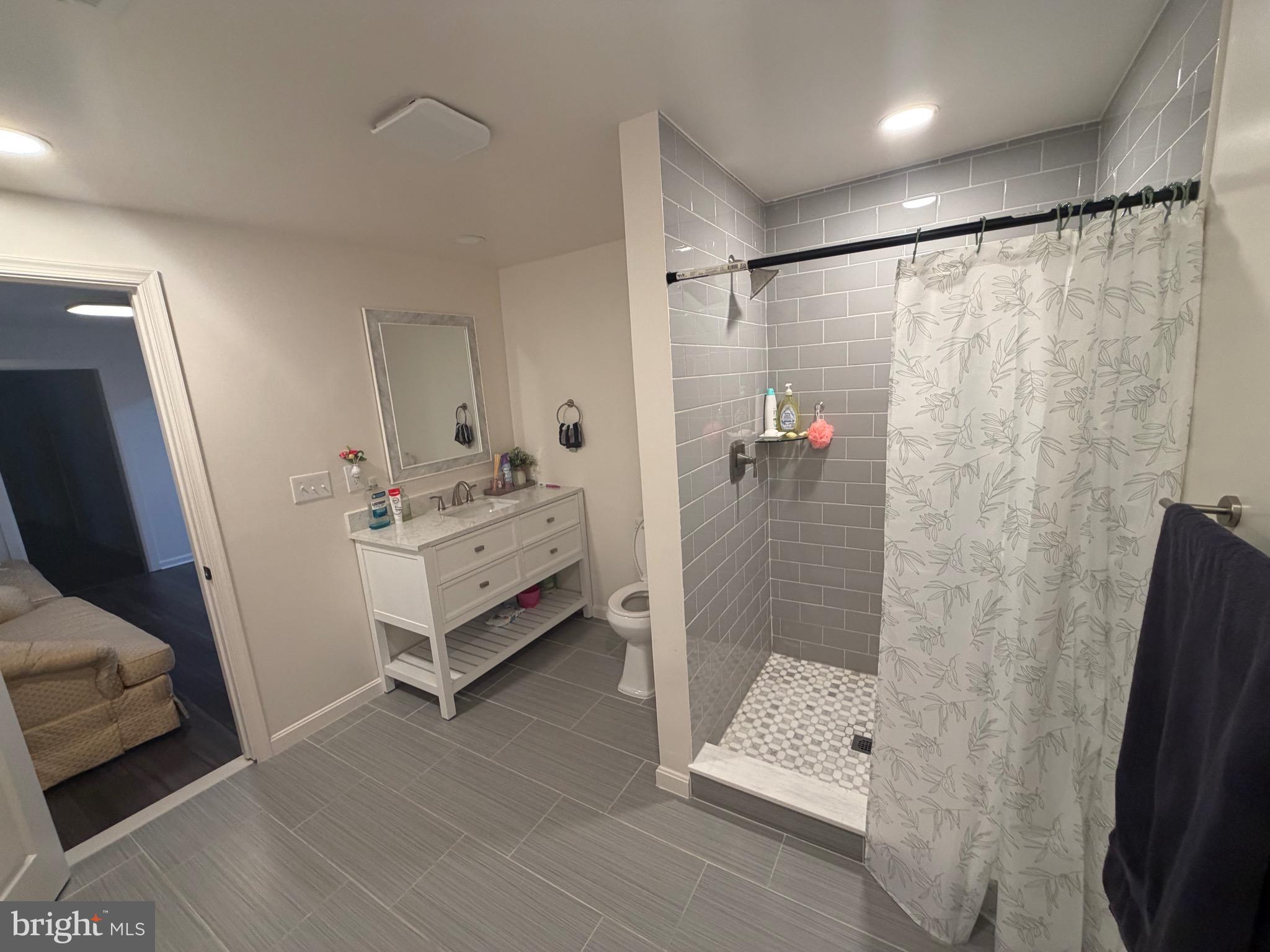 9250 Slidell La Plata, MD 20646 - Photo 20 of 43 a bathroom with a sink and a shower