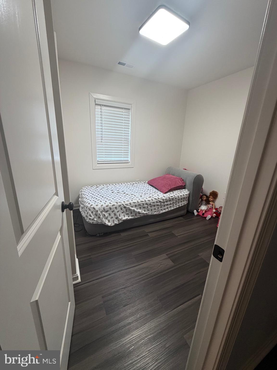 9250 Slidell La Plata, MD 20646 - Photo 30 of 43 a bedroom with a bed and a window