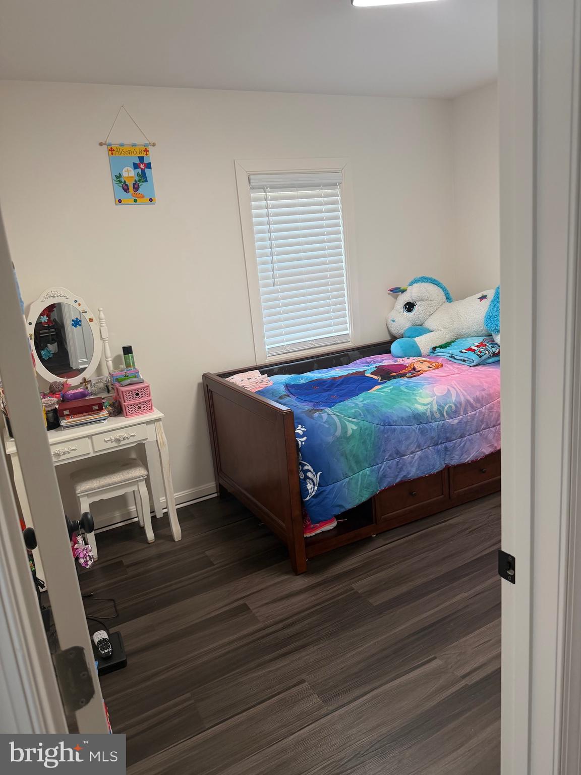 9250 Slidell La Plata, MD 20646 - Photo 34 of 43 a bed sitting in a bedroom next to a window