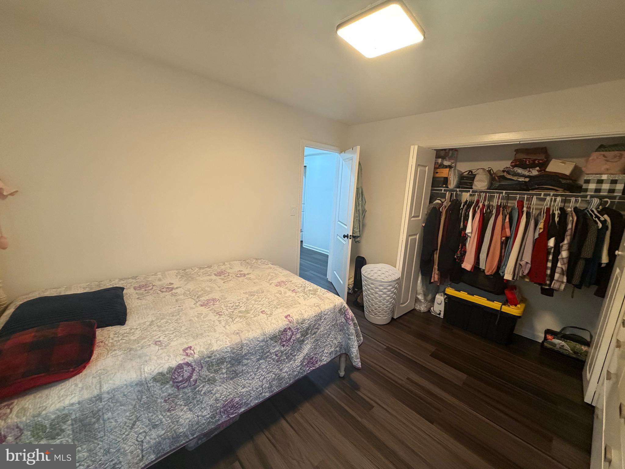 9250 Slidell La Plata, MD 20646 - Photo 35 of 43 a bedroom with a bed and a walk in closet