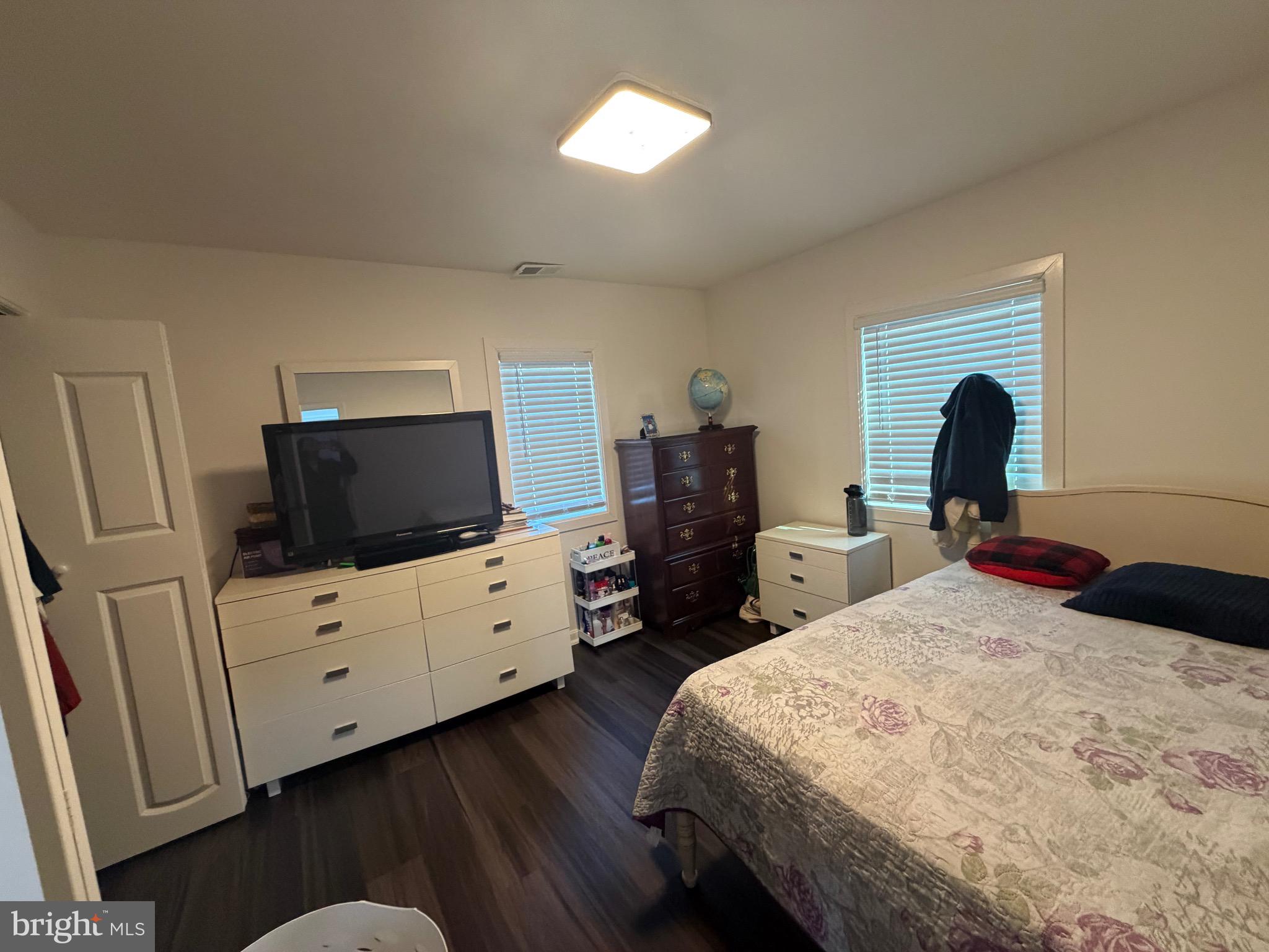 9250 Slidell La Plata, MD 20646 - Photo 36 of 43 a bedroom with a bed and a flat screen tv