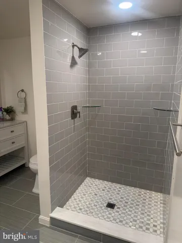 a bathroom with a sink a toilet