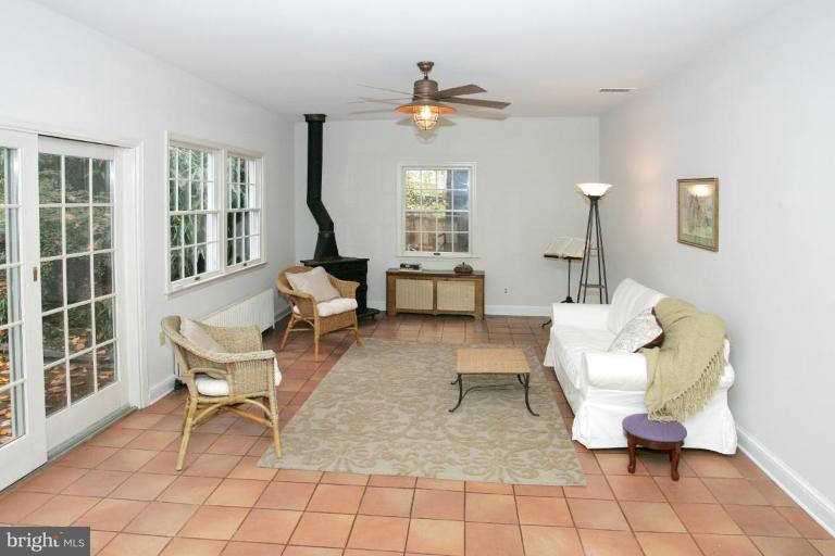 8703 Ridge Road Bethesda, MD 20817 - Photo 4 of 8 a living room with furniture and a window