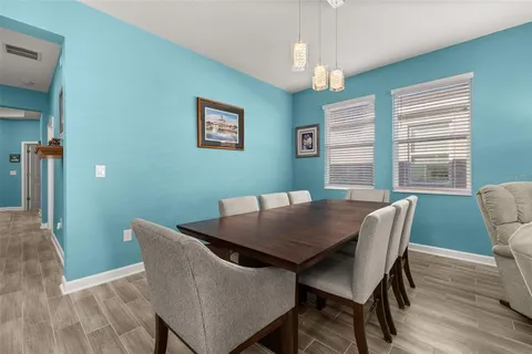 a kitchen with a sink a stove and cabinets