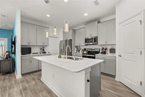 a bathroom with a bathtub and a sink