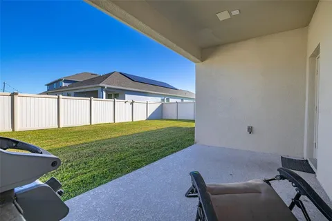 an aerial view of residential building with beach