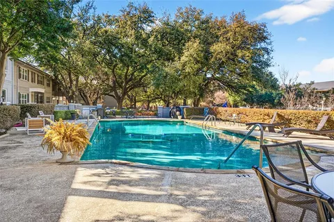 a view of a backyard with a patio