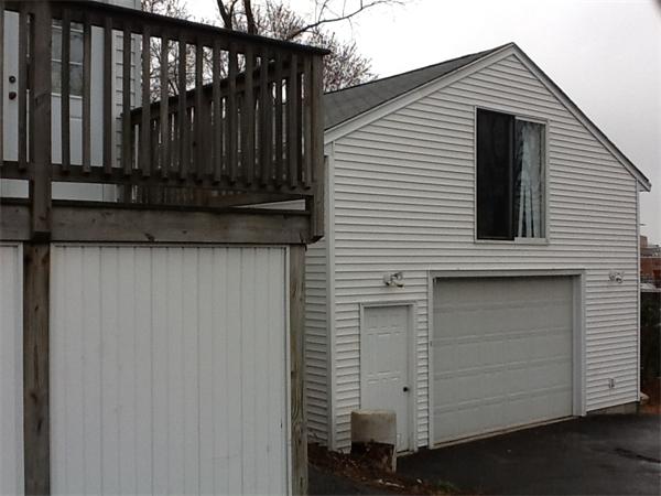 15 County Road Everett, MA 02149 - Photo 18 of 19 a view of a house with a door