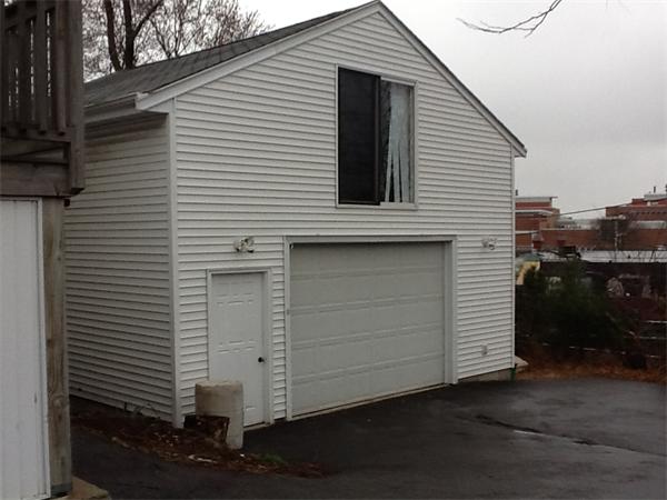 15 County Road Everett, MA 02149 - Photo 19 of 19 a view of a house with a yard