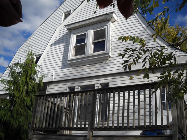 15 County Road Everett, MA 02149 - Photo 4 of 19 a front view of a house