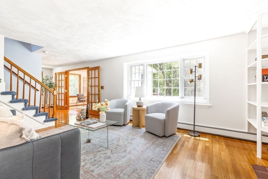 21 Vanderbelt Road Acton, MA 01720 - Photo 6 of 36 a living room with furniture and large windows