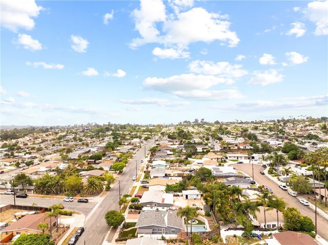 an aerial view of residential building and street