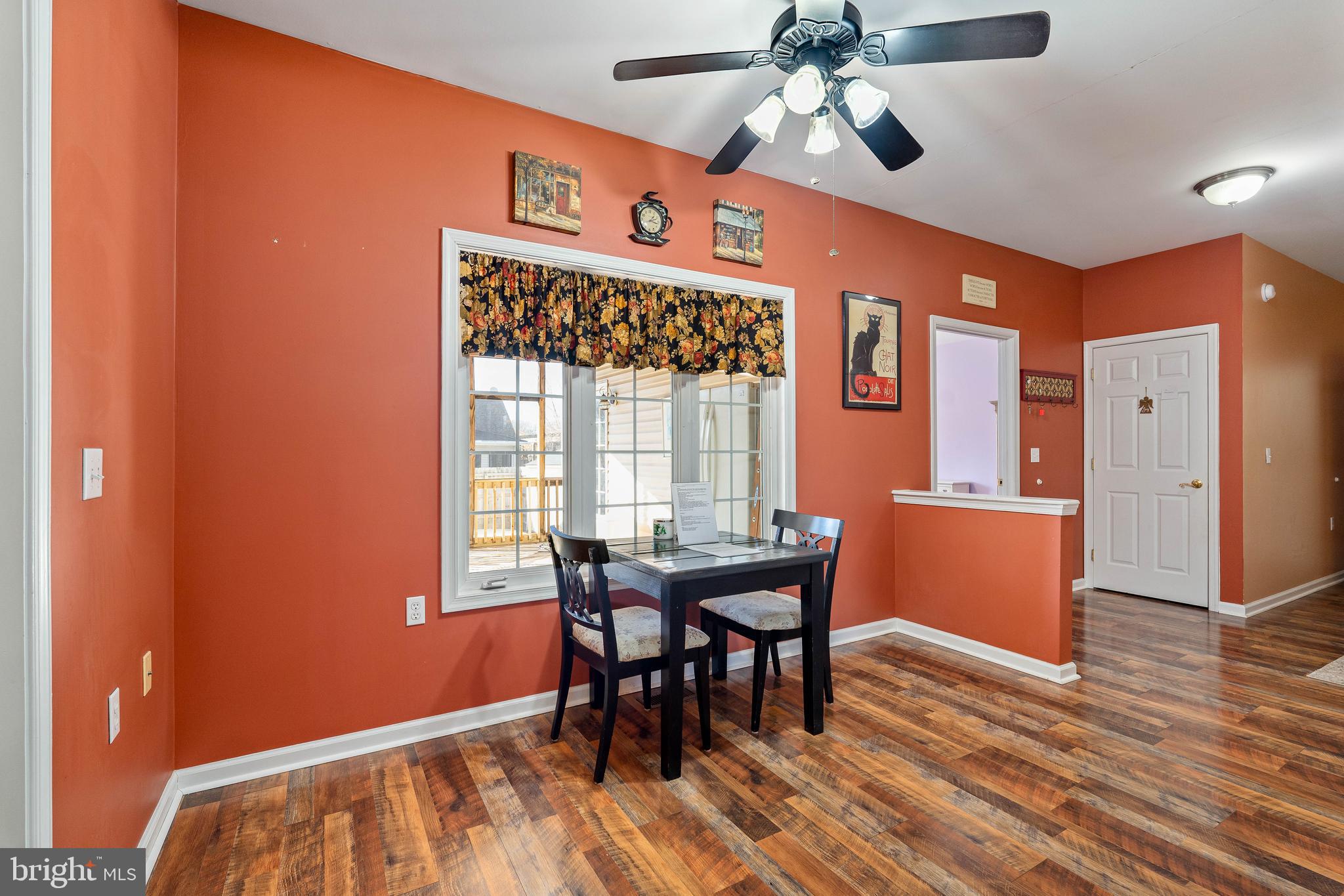 7 Club Lane Earleville, MD 21919 - Photo 20 of 48 a dining room with furniture a chandelier and wooden floor