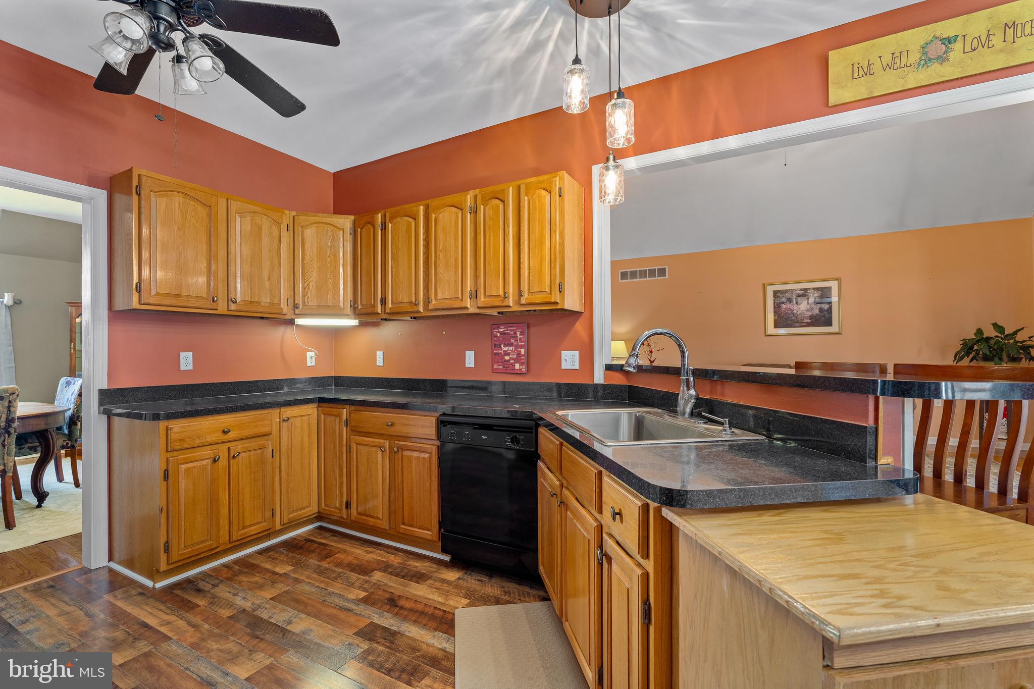 7 Club Lane Earleville, MD 21919 - Photo 22 of 48 a kitchen with granite countertop a sink a counter top space cabinets and stainless steel appliances