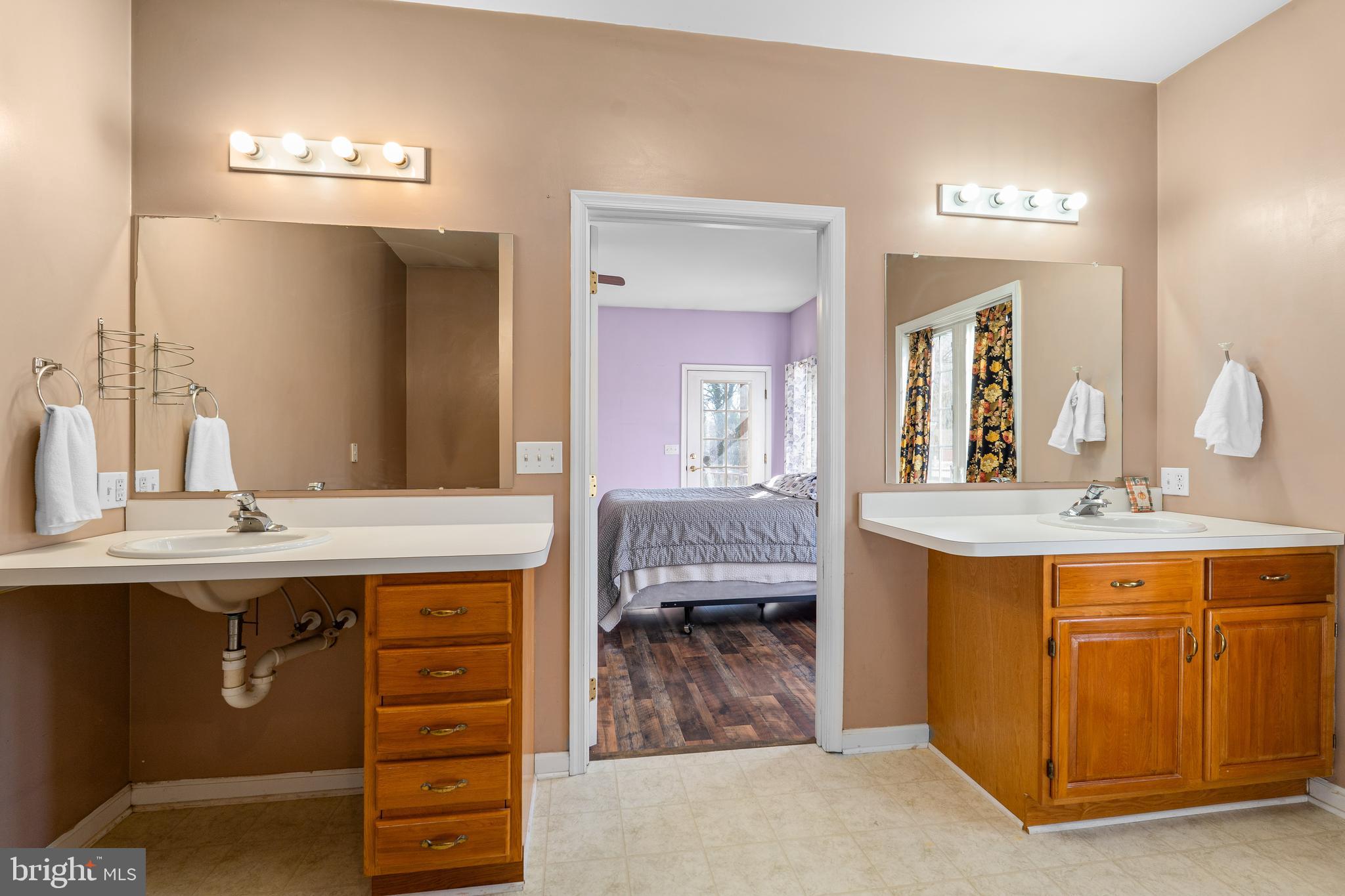 7 Club Lane Earleville, MD 21919 - Photo 29 of 48 a bathroom with a double vanity sink and a mirror