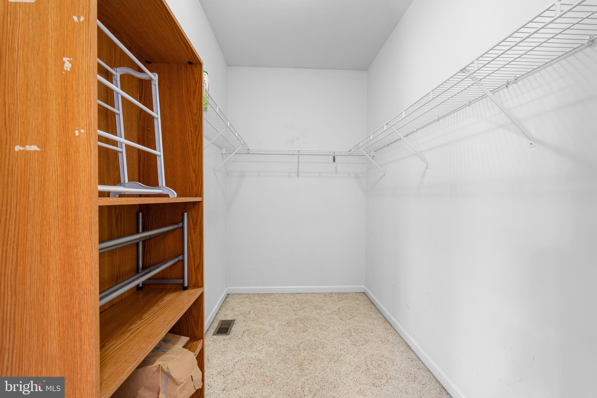 7 Club Lane Earleville, MD 21919 - Photo 30 of 48 a view of walk in closet with empty racks