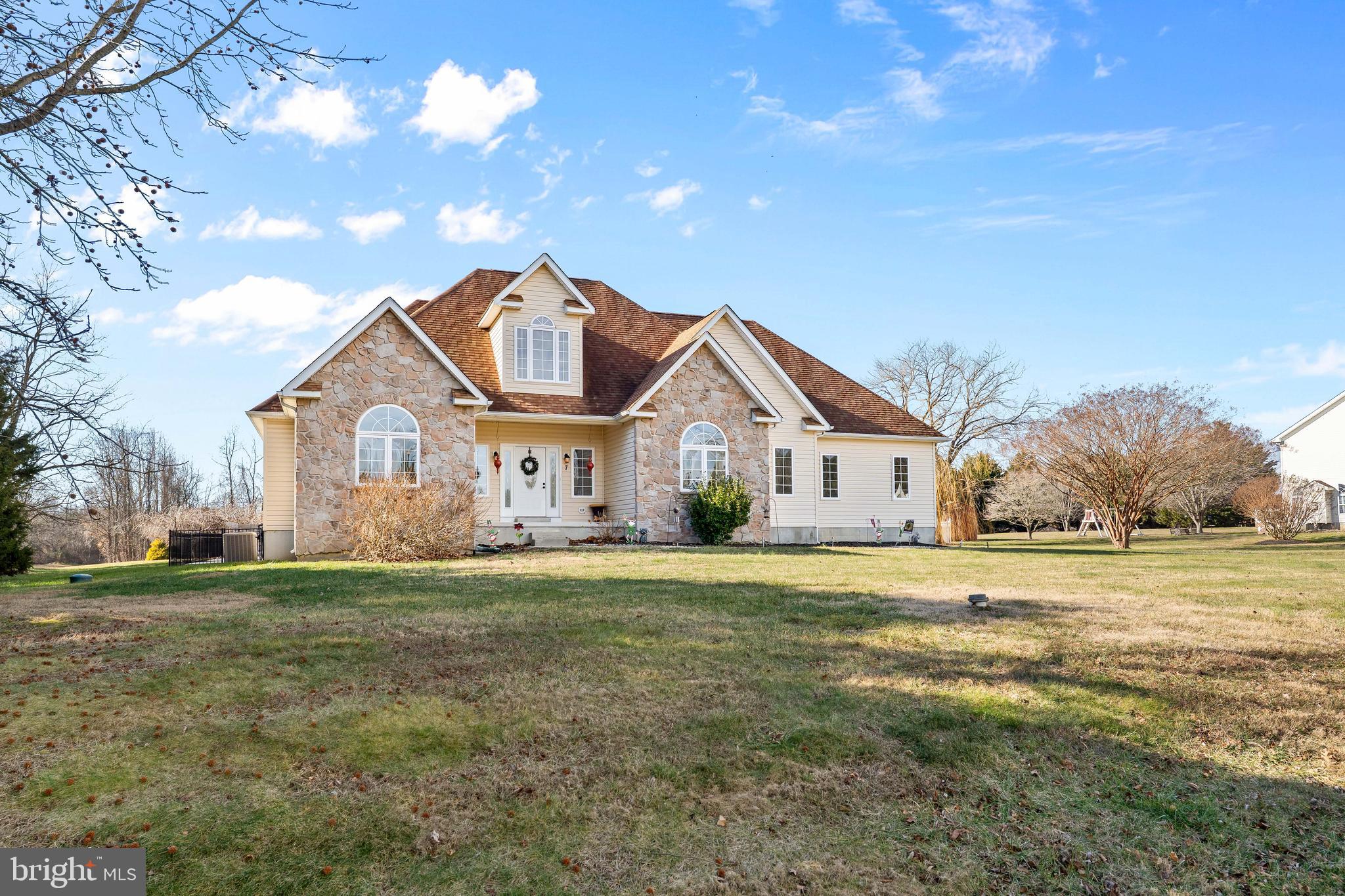 7 Club Lane Earleville, MD 21919 - Photo 5 of 48 a front view of a house with a yard