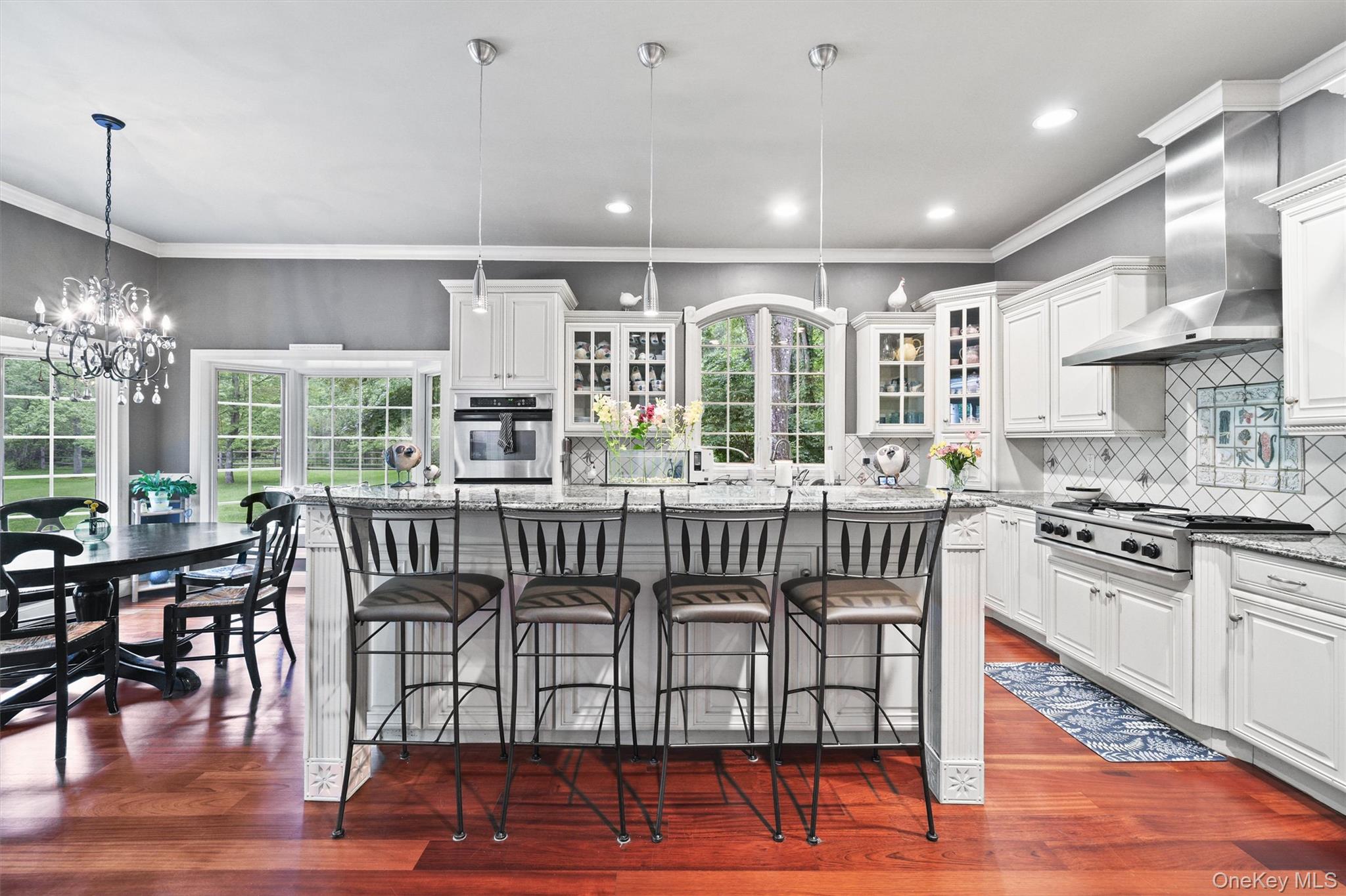 383 Illington Road Ossining, NY 10562 - Photo 14 of 50 a view of a kitchen with dining table and chairs