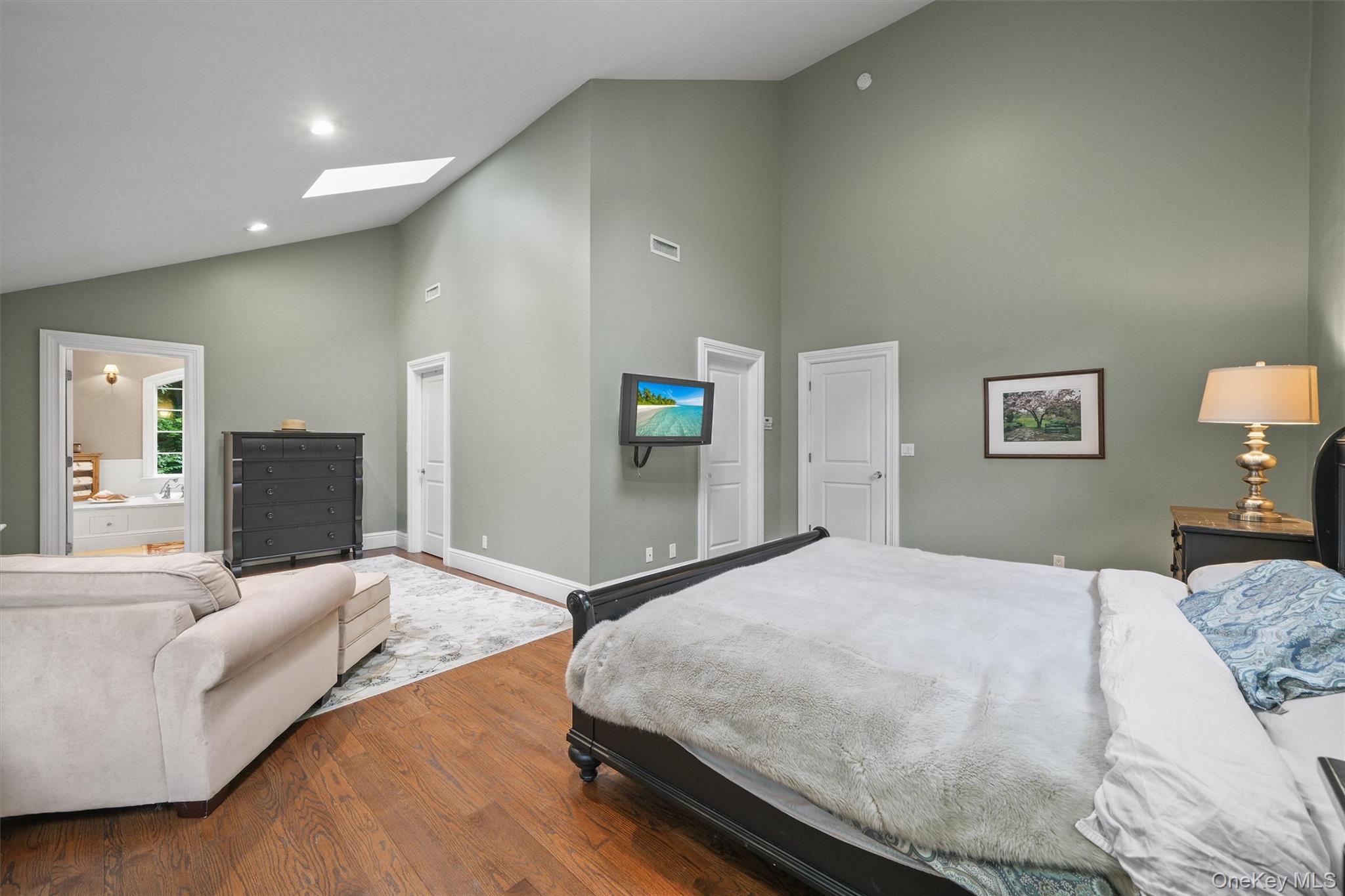 383 Illington Road Ossining, NY 10562 - Photo 22 of 50 a bedroom with a bed and a couch