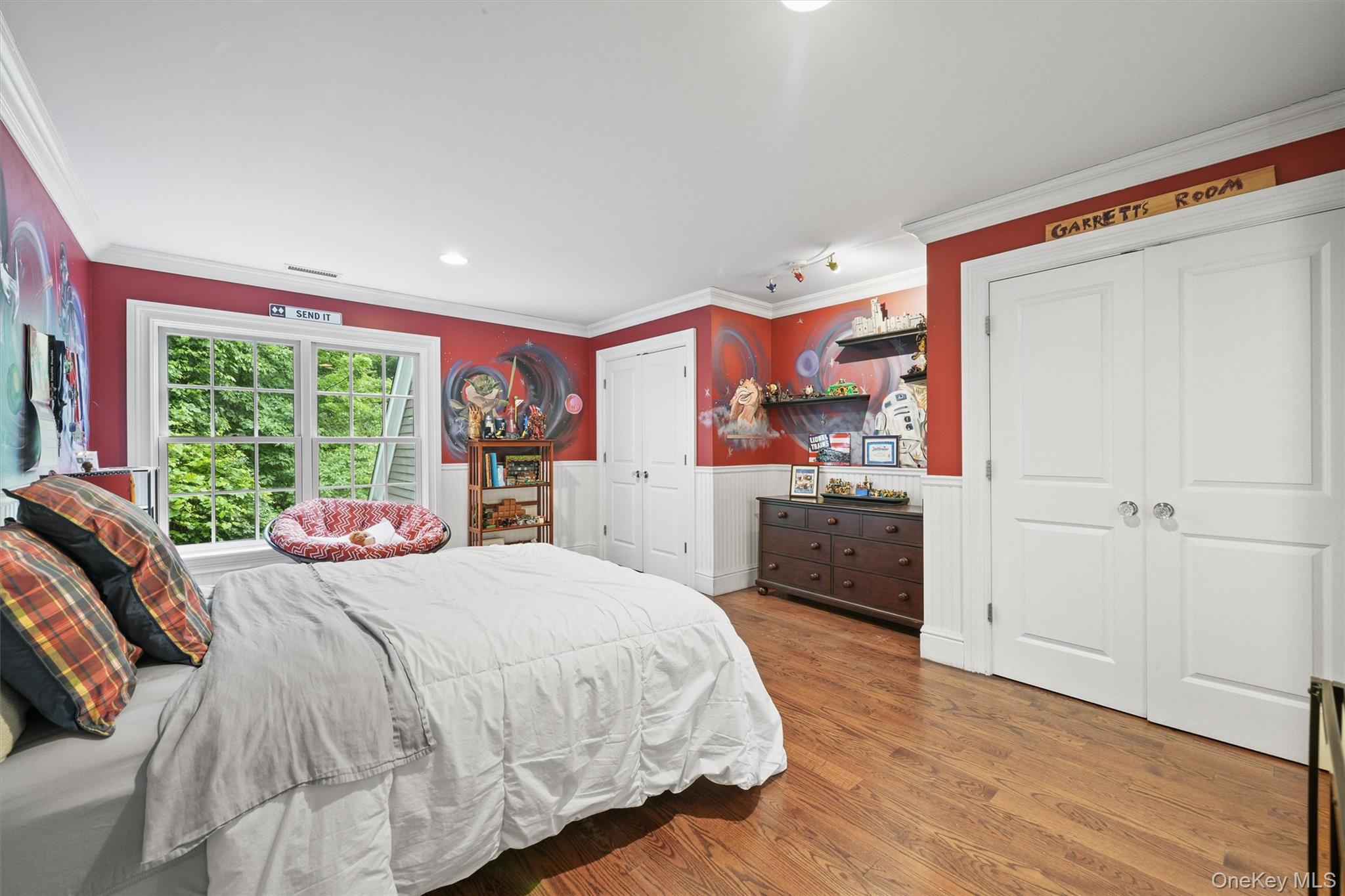 383 Illington Road Ossining, NY 10562 - Photo 30 of 50 a bedroom with a bed and a dresser