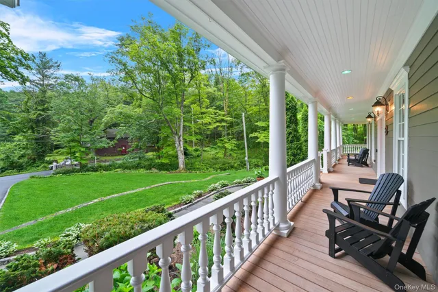 a view of a two chairs in the deck