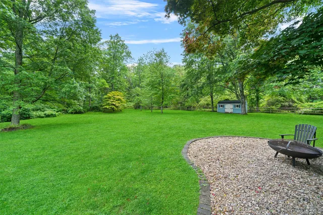 a view of a garden with an outdoor space