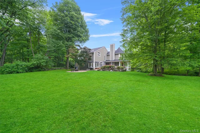 a view of a house with a big yard