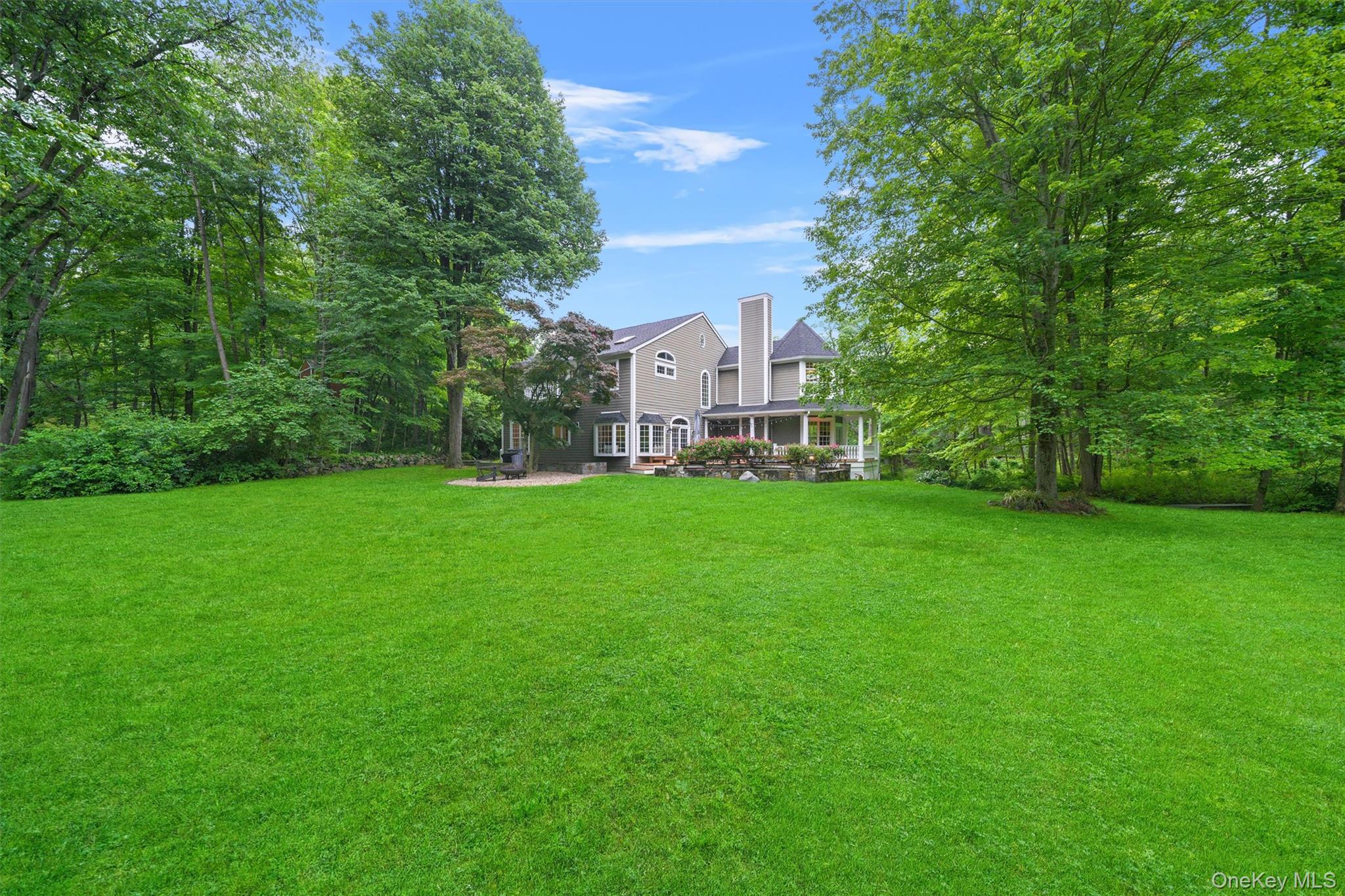 383 Illington Road Ossining, NY 10562 - Photo 45 of 50 a view of a house with a big yard