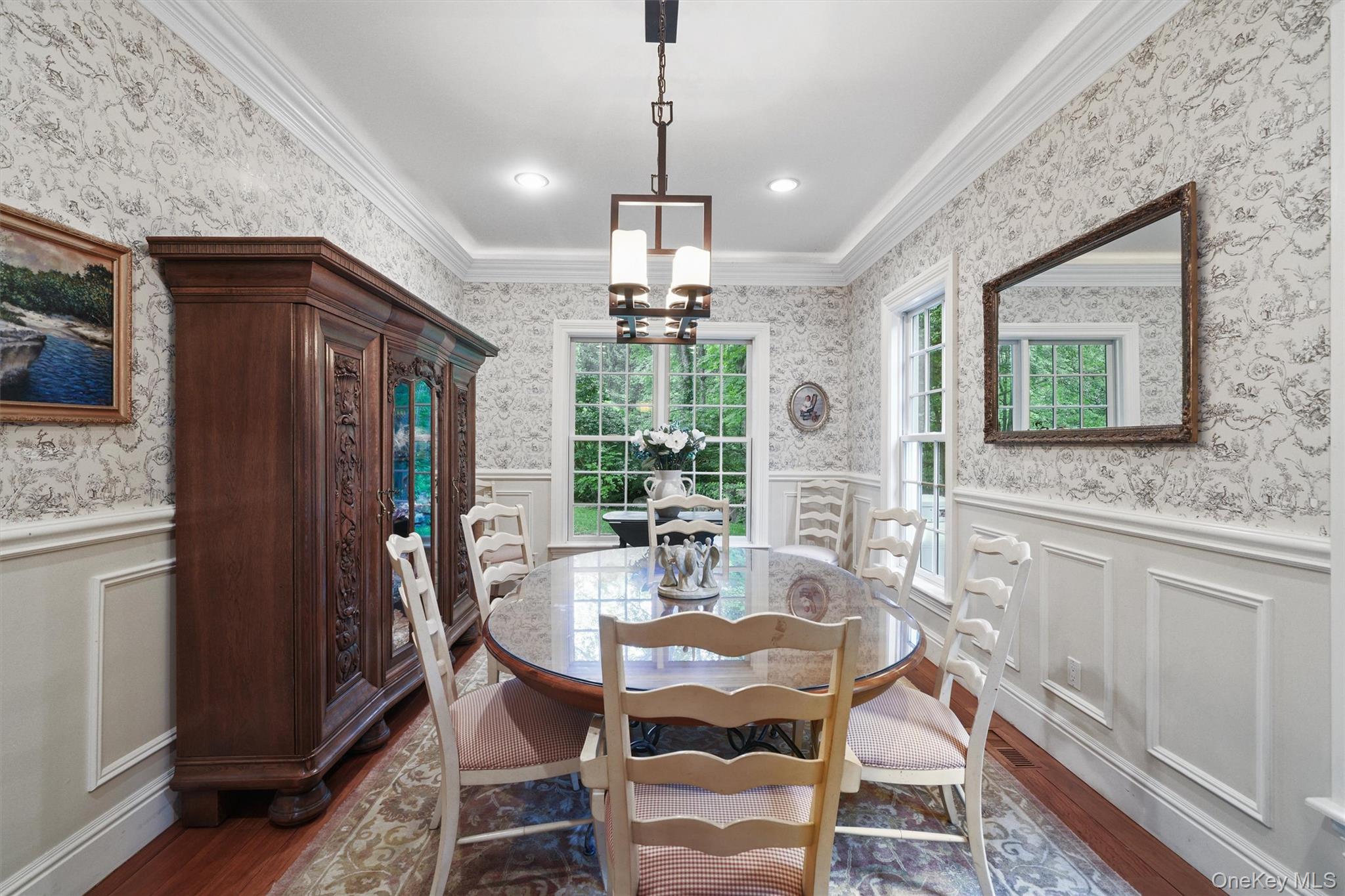 383 Illington Road Ossining, NY 10562 - Photo 9 of 50 a dining room with furniture a chandelier and wooden floor