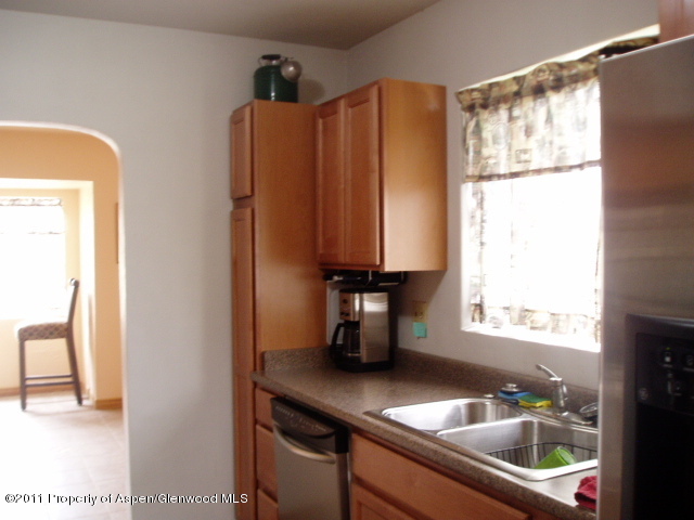 430 Clarkson Avenue Rifle, CO 81650 - Photo 7 of 14 a kitchen with a sink and a window