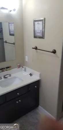 a bathroom with a bathtub and a window