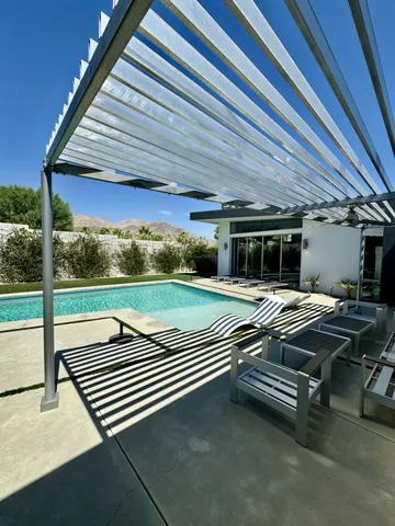 a view of a patio with wooden floor