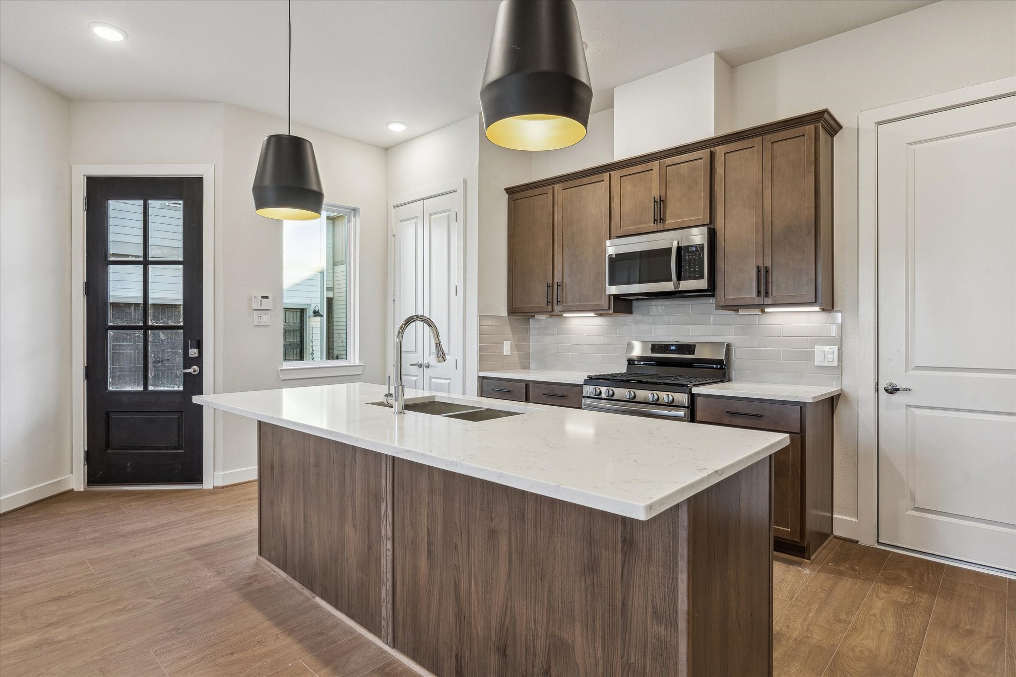 6547 Rena Street Houston, TX 77092 - Photo 2 of 10 Kitchen – Previous work by the builder in the community, not representation of exact unit listed.